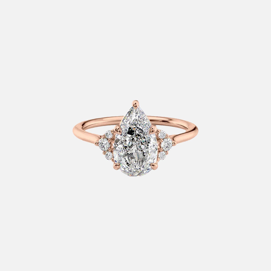 The Violet Pear Side Stone Moissanite Ring - KNT - Engagement Rings, Wedding Bands & Fine Jewelry