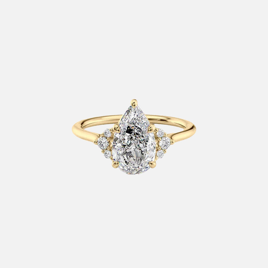 The Violet Pear Side Stone Moissanite Ring - KNT - Engagement Rings, Wedding Bands & Fine Jewelry