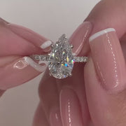 The Pave Infinity Pear Moissanite Ring