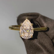 The Solitaire Lexie Pear Moissanite Ring